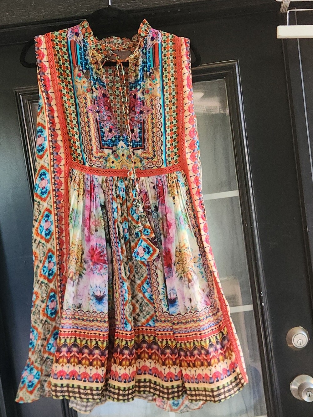 This colorful Bhanuni by Jyoti babydoll tunic dress features an intricate, vibra - Picture 8 of 8